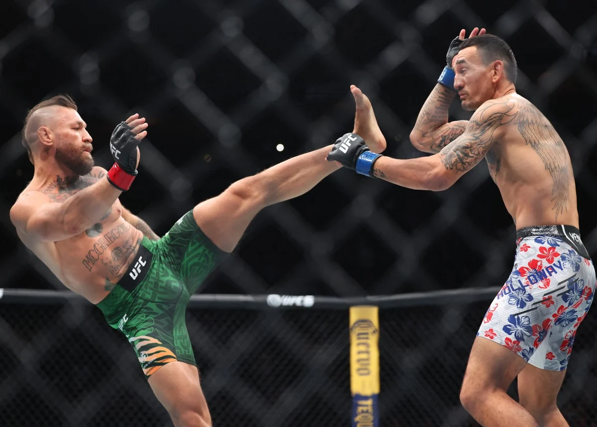 UFC 329: Veja as Melhores Fotos do Confronto Épico entre Conor McGregor e Max Holloway que Parou o Mundo!
