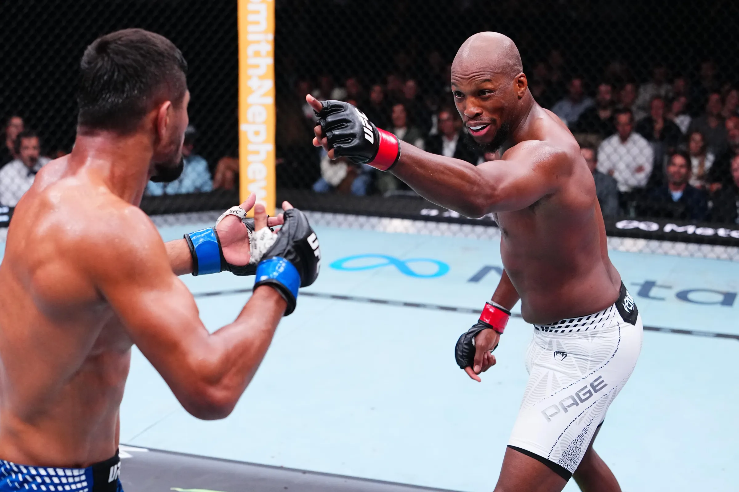 Michael Page: Ex-Campeão Robert Whittaker Elogia ‘Point-Fighting’ e Sugere ‘Feed ao Vivo’ da Pontuação dos Juízes no UFC